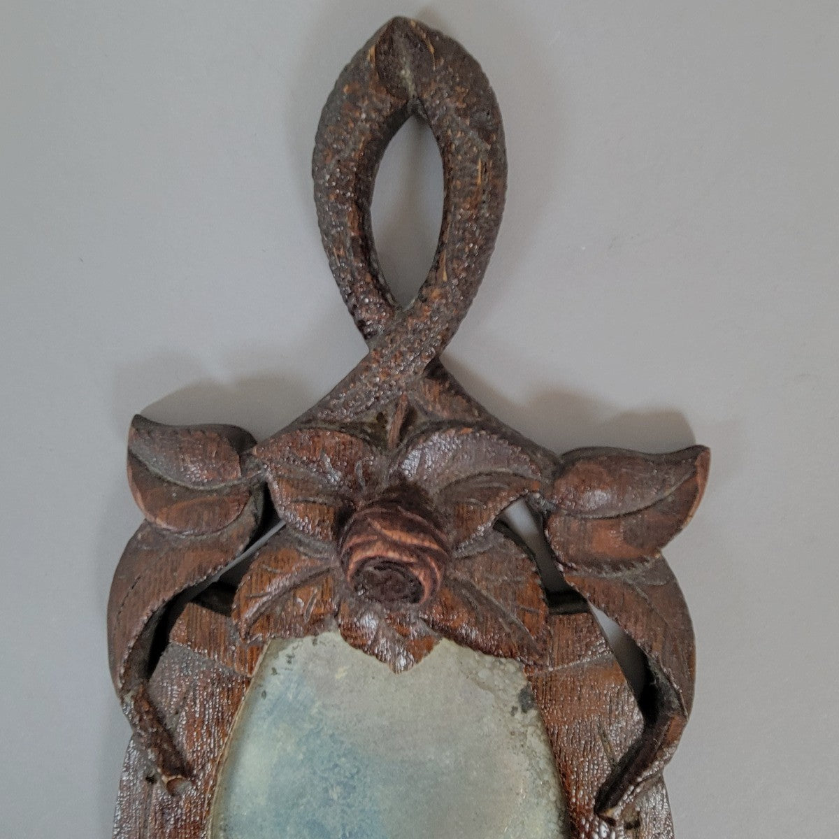 Late 19th Century American Folk Art Horseshoe Wall Mirror with Carved Dove