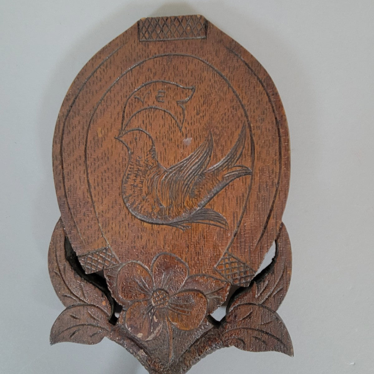 Late 19th Century American Folk Art Horseshoe Wall Mirror with Carved Dove